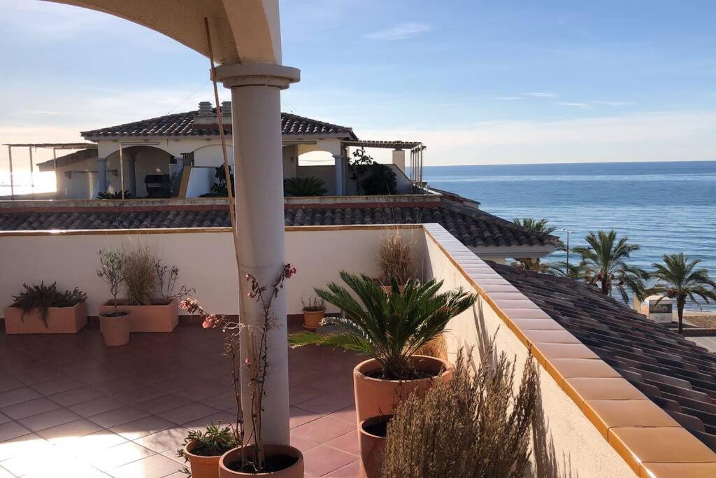 Cal Salmare Seafront Apartment With Rooftop Terrace And Pool Calafell Bagian luar foto